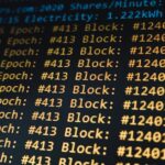 Detailed view of a cryptocurrency mining software interface displaying real-time data on a computer monitor.